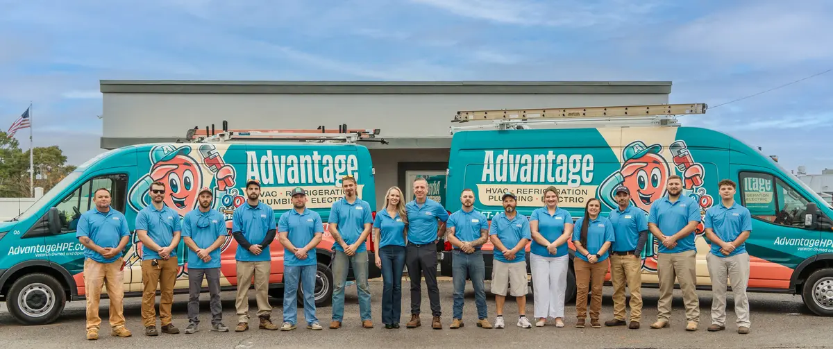 Advantage HVAC, Plumbing, and Electrical team with service vans