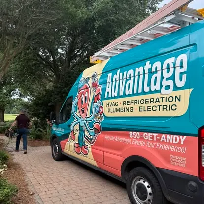 Advantage van on a service call Advantage HVAC, Refrigeration, Plumbing and Electric van with 850-GET-ANDY on the side, parked in a brick driveway on a service call along the Emerald Coast